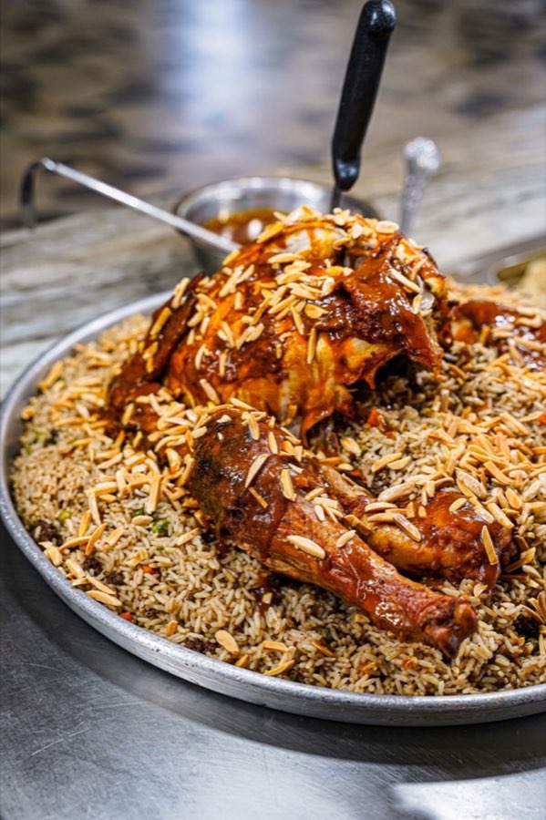 Dimassi’s chicken topped with sumac and onions.