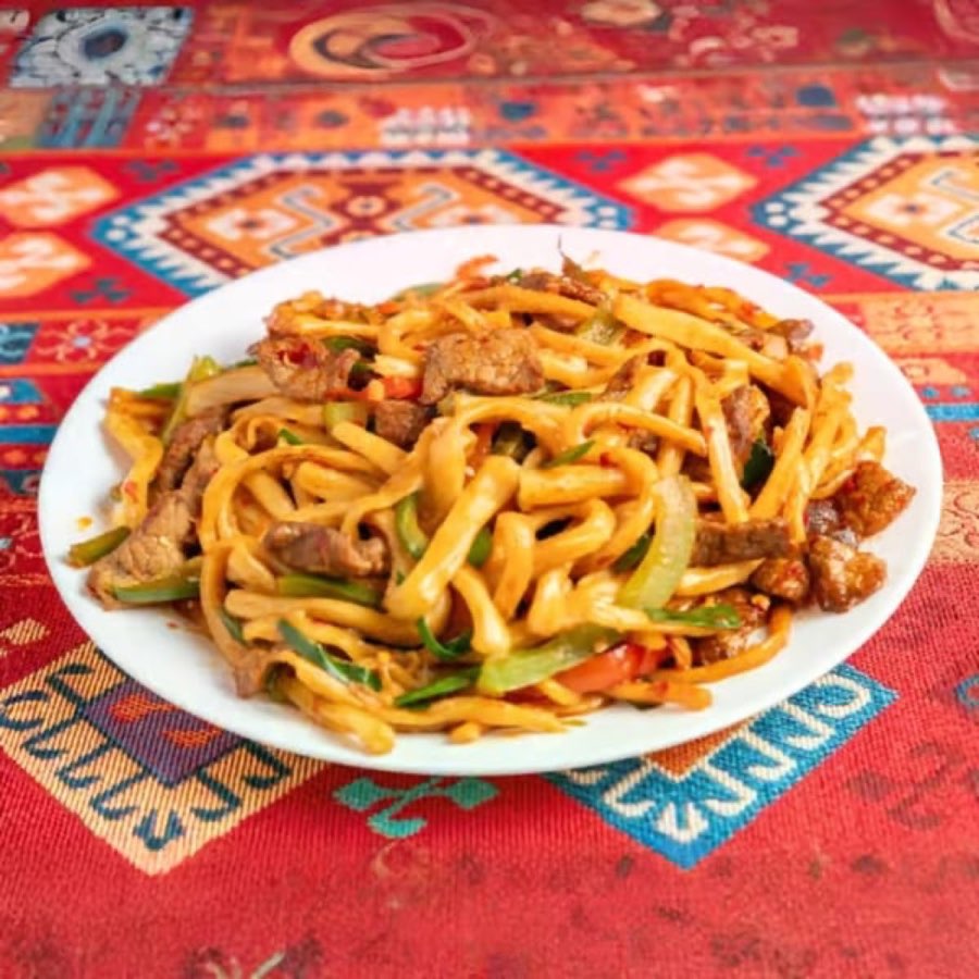 Stir-fried noodles with beef and vegetables from Turan’s official gallery