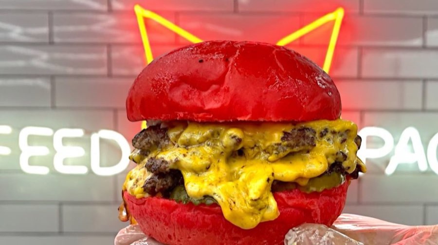 Wulf Burger’s red-bun burger with fries.
